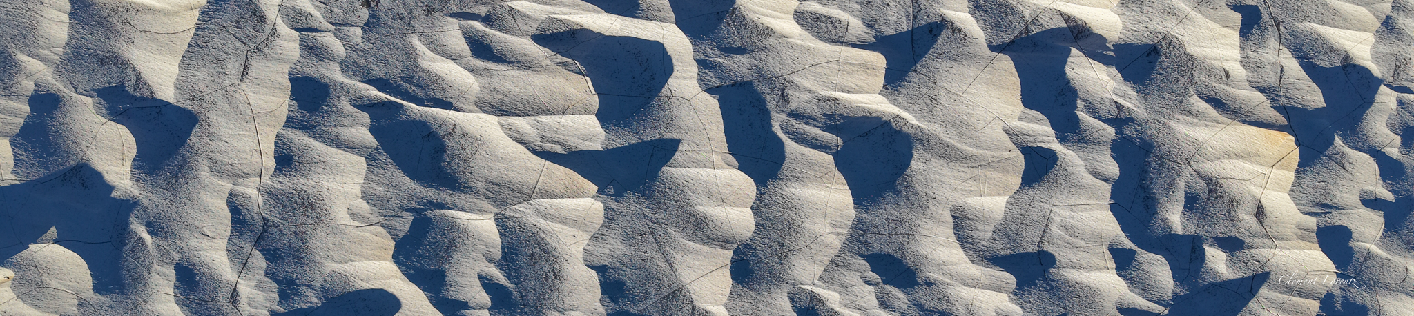 Drone view of Campo de Piedra Pomez with its white pumice stone formations and mineral ridges.