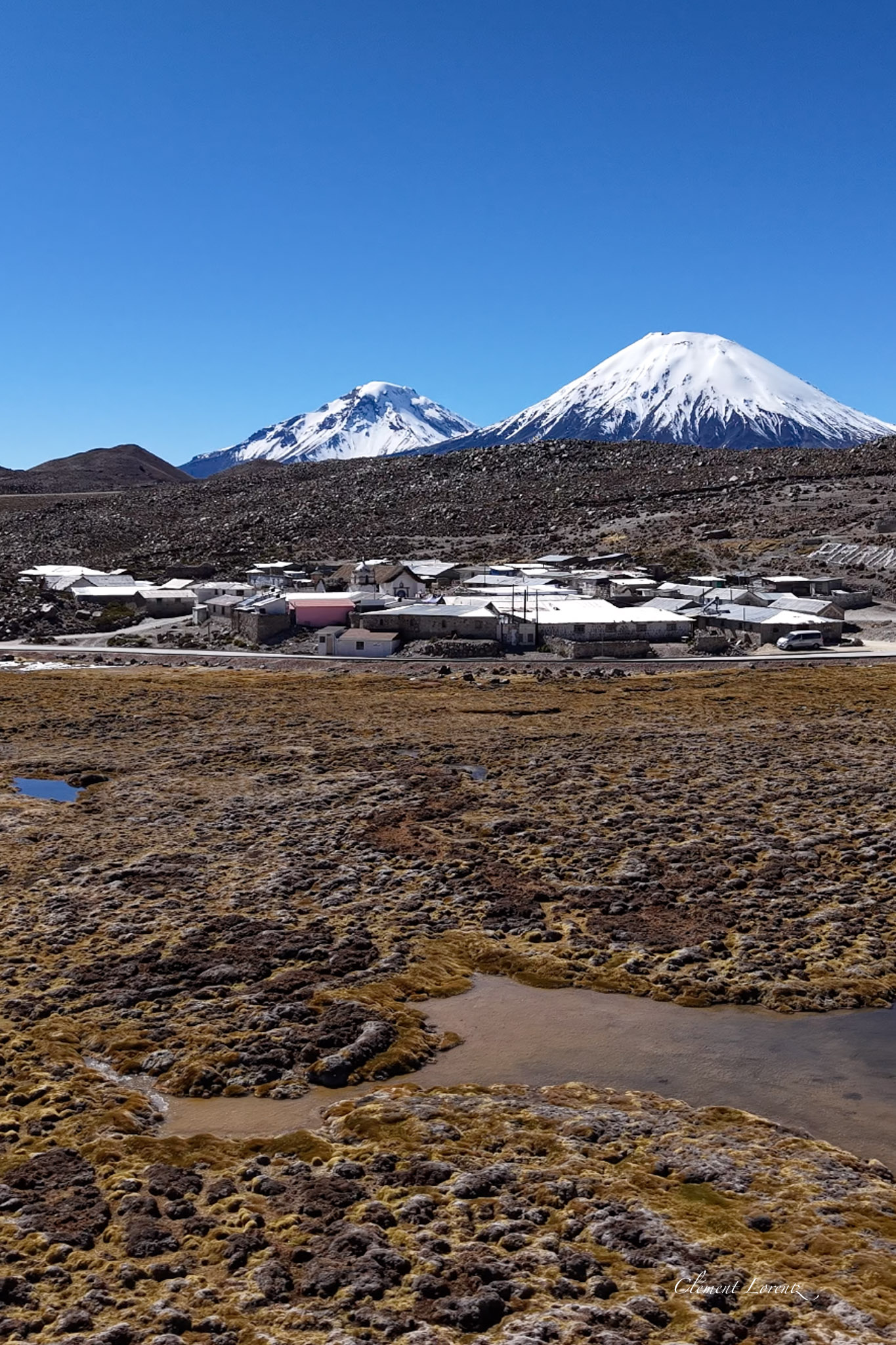 Parinacota village with Parinacota Volcano behind